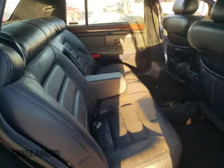 1994 Cadillac DeVille z VIN 1G6KD52B3RU283575, wystawiony jako Copart lot #73576044 z przebiegiem 133 977 mil mil oraz Czysty tytuł • Clean title. Historia ofert i sprzedaży dostępna na DreamBid. Obrazek 10.
