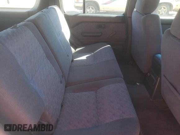 1996 Nissan Pathfinder XE z VIN JN8AR05Y6TW021708, wystawiony jako Copart lot #72991034 z przebiegiem 186 576 mil mil oraz Szkoda całkowita • Salvage title. Historia ofert i sprzedaży dostępna na DreamBid. Obrazek 11.