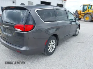2021 Chrysler Voyager LXi with VIN 2C4RC1DG2MR542658, listed as a IAAI auction lot 42171818 with 62,123 mi miles and . Bid and sale history available at DreamBid. Image 4.