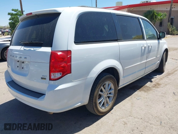 2014 Dodge Grand Caravan SXT with VIN 2C4RDGCG1ER429495, listed as a IAAI auction lot 42058513 with 136,936 mi miles and . Bid and sale history available at DreamBid. Image 4.