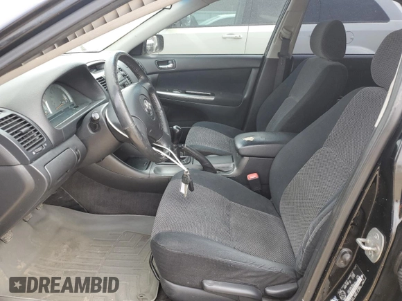 2004 Toyota Camry LE with VIN JTDBE32K940288536, listed as a Copart auction lot 54106555 with 246,661 mi miles and Clean Title. Bid and sale history available at DreamBid. Image 7.