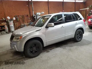 2011 Suzuki Grand Vitara Premium z VIN JS3TD0D21B4101235, wystawiony jako Copart lot #55765295 z przebiegiem 108 375 mil mil oraz Szkoda całkowita • Salvage title. Historia ofert i sprzedaży dostępna na DreamBid. Obrazek 1.