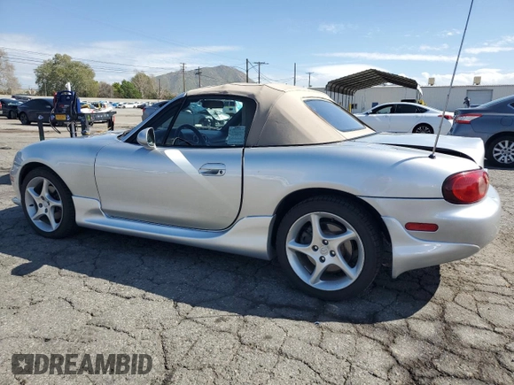 2003 Mazda MX-5 Miata Cloth z VIN JM1NB353430301685, wystawiony jako Copart lot #48756715 z przebiegiem 57 414 mil mil oraz Szkoda całkowita • Salvage title. Historia ofert i sprzedaży dostępna na DreamBid. Obrazek 2.