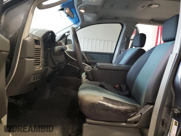 2004 Nissan Titan LE with VIN 1N6AA07B74N507976, listed as a Copart auction lot 56402785 with 181,253 mi miles and Salvage title. Bid and sale history available at DreamBid. Image 7.