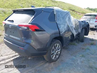 2022 Toyota RAV4 XLE Premium with VIN 2T3C1RFV5NC195230, listed as a IAAI auction lot 40495536 with 30,824 mi miles and . Bid and sale history available at DreamBid. Image 4.
