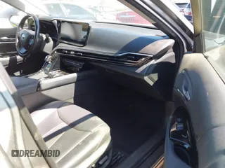 2021 Toyota Mirai XLE with VIN JTDAAAAAXMA002000, listed as a IAAI auction lot 42207752 with 33,017 mi miles and . Bid and sale history available at DreamBid. Image 5.
