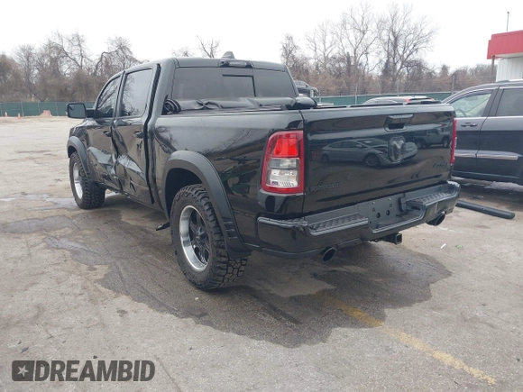 2022 Ram 1500 Big Horn with VIN 1C6SRFFT3NN287385, listed as a IAAI auction lot 41793596 with 12,277 mi miles and . Bid and sale history available at DreamBid. Image 3.