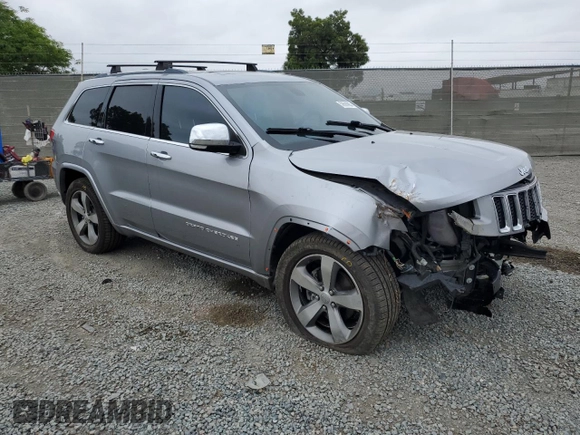 2015 Jeep Grand Cherokee Overland with VIN 1C4RJECG4FC808241, listed as a Copart auction lot 59699685 with 67,542 mi miles and Salvage title. Bid and sale history available at DreamBid. Image 4.