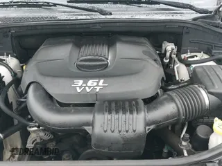 2012 Jeep Grand Cherokee Laredo z VIN 1C4RJFAG3CC149511, wystawiony jako IAAI lot #43292125 z przebiegiem 183 711 mil mil oraz . Historia ofert i sprzedaży dostępna na DreamBid. Obrazek 19.