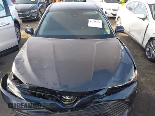 2020 Toyota Camry LE with VIN 4T1C11AK0LU864863, listed as a IAAI auction lot 41748371 with 82,063 mi miles and . Bid and sale history available at carsss.com. Image 12.