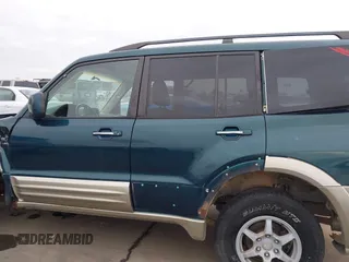 2002 Mitsubishi Montero Limited z VIN JA4MW51RX2J040586, wystawiony jako IAAI lot #41566077 z przebiegiem 149 851 mil mil oraz . Historia ofert i sprzedaży dostępna na DreamBid. Obrazek 14.