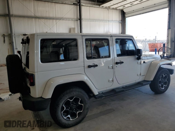 2015 Jeep Wrangler Unlimited Sahara with VIN 1C4BJWEG2FL620001, listed as a Copart auction lot 63914725 with 114,810 mi miles and Salvage title. Bid and sale history available at DreamBid. Image 3.