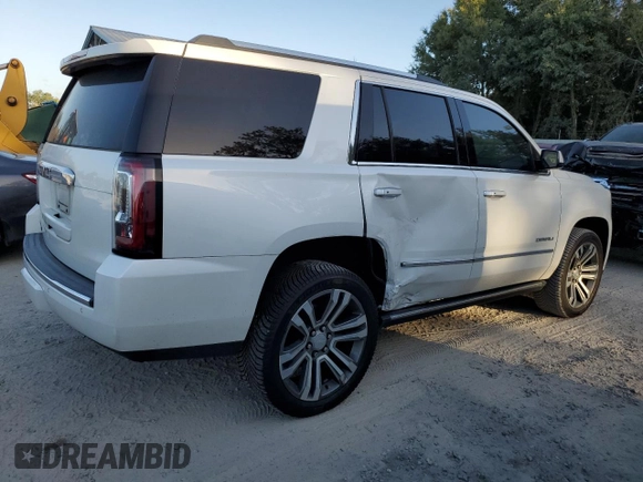2019 GMC Yukon Denali with VIN 1GKS1CKJ8KR353280, listed as a Copart auction lot 77316454 with 74,476 mi miles and Salvage Title. Bid and sale history available at carsss.com. Image 3.