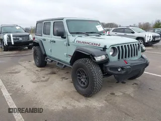 2023 Jeep Wrangler Rubicon with VIN 1C4JJXFG7PW654564, listed as a IAAI auction lot 41833534 with 22,277 mi miles and . Bid and sale history available at DreamBid. Image 1.