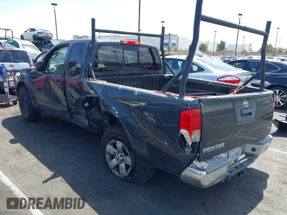 2013 Nissan Frontier SV with VIN 1N6AD0CU5DN756212, listed as a IAAI auction lot 41948516 with 127,015 mi miles and . Bid and sale history available at DreamBid. Image 3.