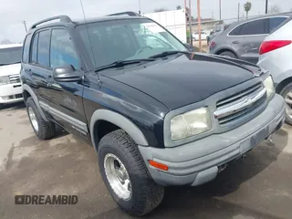 2003 Chevrolet Tracker ZR2 z VIN 2CNBJ734536931923, wystawiony jako IAAI lot #41641054 z przebiegiem 111 247 mil mil oraz . Historia ofert i sprzedaży dostępna na DreamBid. Obrazek 1.