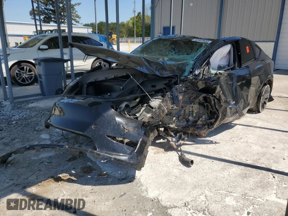 2022 Tesla Model Y Performance z VIN 7SAYGDEF2NF448013, wystawiony jako Copart lot #52323435 z przebiegiem Nie podano mil oraz Nie do naprawy • Non repairable. Historia ofert i sprzedaży dostępna na DreamBid. Obrazek 1.