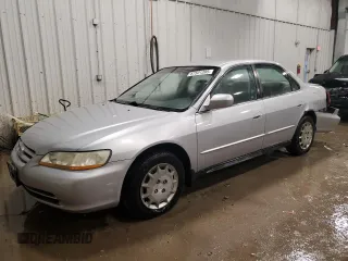 2002 Honda Accord LX with VIN 1HGCG56482A145317, listed as a Copart auction lot 87501395 with 166,306 mi miles and Non repairable. Bid and sale history available at DreamBid. Image 1.