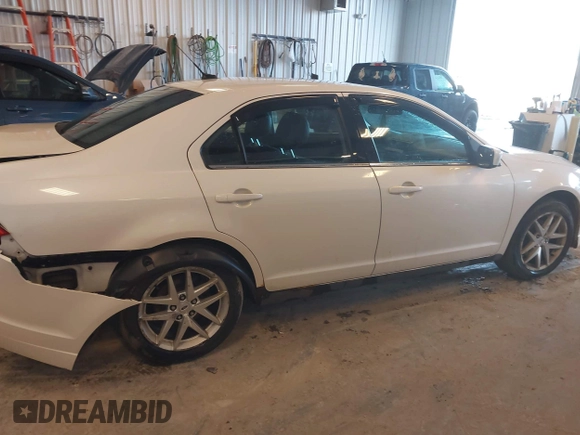 2012 Ford Fusion SEL with VIN 3FAHP0JGXCR128976, listed as a IAAI auction lot 41721468 with 115,277 mi miles. Bid and sale history available at carsss.com. Image 13.