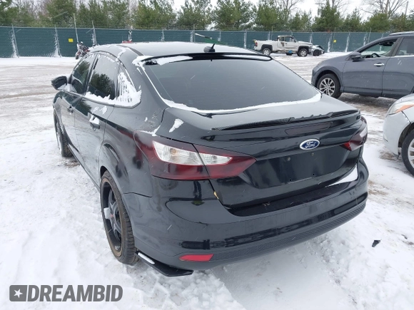 2013 Ford Focus SE z VIN 1FADP3F28DL337355, wystawiony jako IAAI lot #41000947 z przebiegiem 139 456 mil mil oraz . Historia ofert i sprzedaży dostępna na DreamBid. Obrazek 3.