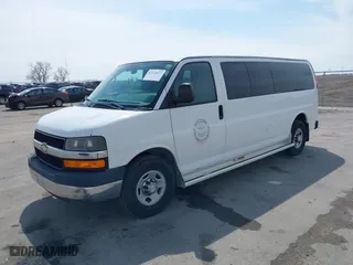 2013 Chevrolet Express Passenger 1LT with VIN 1GAZG1FA1D1191719, listed as a IAAI auction lot 42124977 with 92,228 mi miles. Bid and sale history available at carsss.com. Image 2.