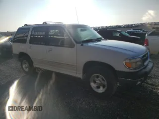 1999 Ford Explorer XL z VIN 1FMZU34XXXUB80803, wystawiony jako Copart lot #87027834 z przebiegiem 222 864 mil mil oraz Szkoda całkowita • Salvage title. Historia ofert i sprzedaży dostępna na DreamBid. Obrazek 4.