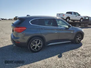 2016 BMW X1 xDrive28i z VIN WBXHT3C37G5E51737, wystawiony jako Copart lot #52441845 z przebiegiem 91 910 mil mil oraz Szkoda całkowita • Salvage title. Historia ofert i sprzedaży dostępna na DreamBid. Obrazek 3.