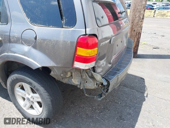 2006 Ford Escape Hybrid z VIN 1FMCU96H86KA52519, wystawiony jako IAAI lot #42443003 z przebiegiem 162 469 mil mil oraz . Historia ofert i sprzedaży dostępna na DreamBid. Obrazek 6.