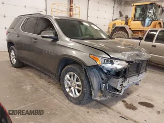 2019 Chevrolet Traverse LT Cloth z VIN 1GNEVGKW7KJ263267, wystawiony jako IAAI lot #41879469 z przebiegiem 120 043 mil mil oraz . Historia ofert i sprzedaży dostępna na DreamBid. Obrazek 1.