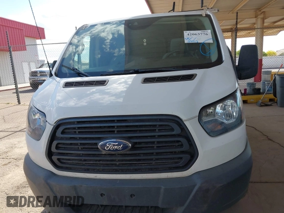 2018 Ford Transit z VIN 1FTYR1YM7JKB53325, wystawiony jako IAAI lot #42063776 z przebiegiem 108 912 mil mil oraz . Historia ofert i sprzedaży dostępna na DreamBid. Obrazek 12.