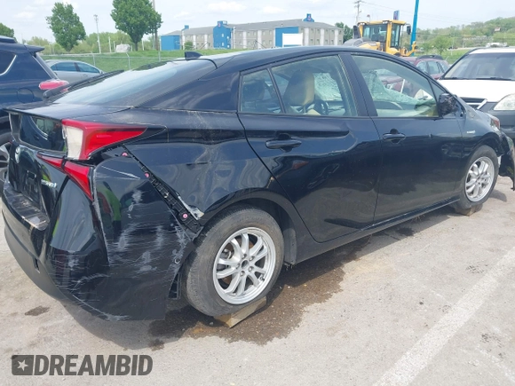 2020 Toyota Prius L Eco z VIN JTDKARFU6L3119565, wystawiony jako IAAI lot #41990990 z przebiegiem Nie podano mil oraz . Historia ofert i sprzedaży dostępna na DreamBid. Obrazek 4.
