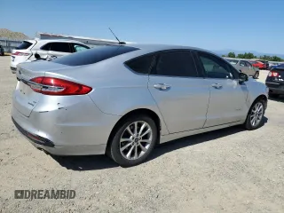 2017 Ford Fusion Hybrid SE with VIN 3FA6P0LU8HR355455, listed as a Copart auction lot 60469935 with 183,105 mi miles and Salvage title. Bid and sale history available at DreamBid. Image 3.