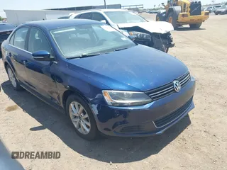 2014 Volkswagen Jetta SE with VIN 3VWD17AJ1EM303577, listed as a IAAI auction lot 42436160 with 113,086 mi miles and . Bid and sale history available at DreamBid. Image 1.