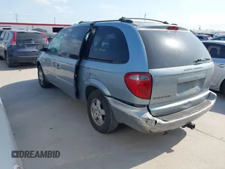 2005 Dodge Caravan SXT with VIN 2D4GP44L25R585797, listed as a IAAI auction lot 42025550 with 232,161 mi miles. Bid and sale history available at carsss.com. Image 3.