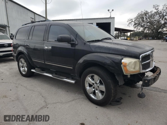 2004 Dodge Durango Limited with VIN 1D4HD58D34F230052, listed as a Copart auction lot 83030794 with 248,279 mi miles and Salvage title. Bid and sale history available at DreamBid. Image 4.