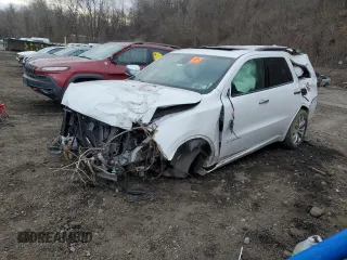 2018 Dodge Durango Citadel with VIN 1C4RDJEG0JC385731, listed as a Copart auction lot 87932675 with 127,015 mi miles and Salvage title. Bid and sale history available at DreamBid. Image 1.
