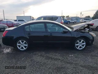 2004 Nissan Maxima SL with VIN 1N4BA41E14C890140, listed as a IAAI auction lot 41018281 with 218,229 mi miles and . Bid and sale history available at DreamBid. Image 14.