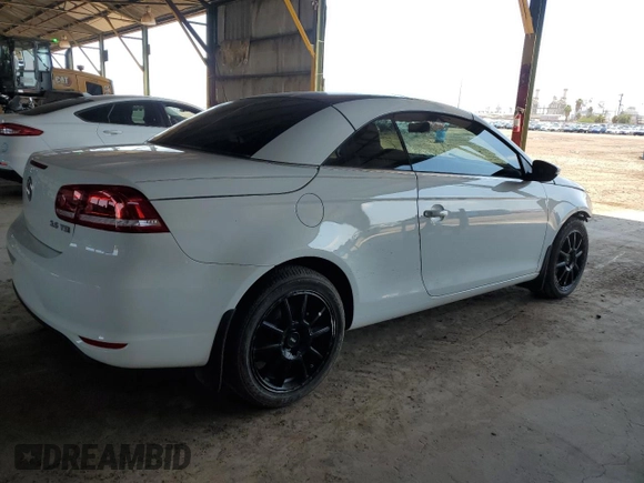 2015 Volkswagen Eos Komfort с VIN WVWBW8AH9FV001976, выставлен на аукционе Copart как лот 59529925 с пробегом 54 520 миль миль и Списание • Salvage title. История ставок и продаж доступна на DreamBid. Изображение 3.