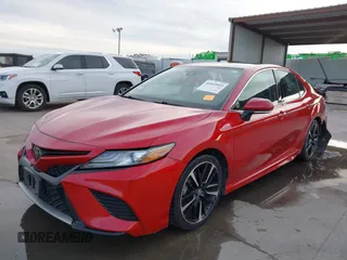 2019 Toyota Camry XSE with VIN 4T1B61HK0KU233466, listed as a IAAI auction lot 41035953 with 122,384 mi miles. Bid and sale history available at carsss.com. Image 2.