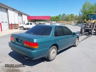 1993 Honda Accord LX with VIN 1HGCB7553PA066813, listed as a IAAI auction lot 41958935 with 454,394 mi miles. Bid and sale history available at carsss.com. Image 4.