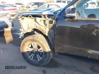 2016 Toyota Tacoma SR with VIN 3TMCZ5AN0GM023263, listed as a IAAI auction lot 41302069 with 137,276 mi miles and . Bid and sale history available at DreamBid. Image 20.