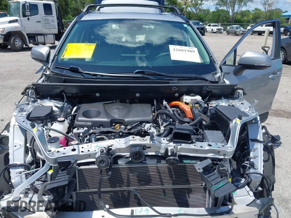 2021 Toyota RAV4 Hybrid LE with VIN 2T3B6RFV2MW018967, listed as a IAAI auction lot 42601989 with 71,046 mi miles and . Bid and sale history available at DreamBid. Image 10.