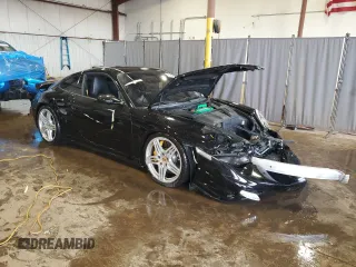 2007 Porsche 911 Turbo with VIN WP0AD29907S786404, listed as a Copart auction lot 51944405 with 70,963 mi miles and Salvage Title. Bid and sale history available at DreamBid. Image 4.