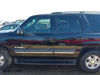 2003 Chevrolet Tahoe LS with VIN 1GNEC13V63R245581, listed as a IAAI auction lot 41599241 with 234,028 mi miles. Bid and sale history available at carsss.com. Image 14.