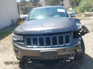 2015 Jeep Grand Cherokee Overland with VIN 1C4RJFCG7FC839778, listed as a IAAI auction lot 42490111 with 160,040 mi miles and . Bid and sale history available at DreamBid. Image 13.