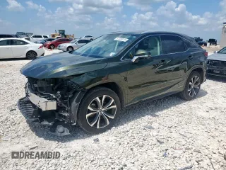 2020 Lexus RX 450h with VIN 2T2HGMDA3LC046646, listed as a Copart auction lot 61030015 with 74,709 mi miles and Salvage title. Bid and sale history available at DreamBid. Image 1.