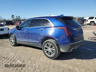 2023 Cadillac XT5 FWD Premium Luxury with VIN 1GYKNCRS3PZ154122, listed as a Copart auction lot 43063675 with 52,279 mi miles and Salvage Title. Bid and sale history available at carsss.com. Image 2.