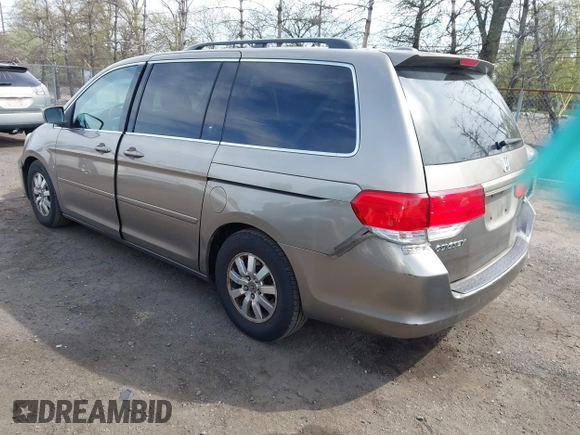 2010 Honda Odyssey EX-L with VIN 5FNRL3H68AB055744, listed as a IAAI auction lot 42107273 with 193,289 mi miles. Bid and sale history available at carsss.com. Image 3.