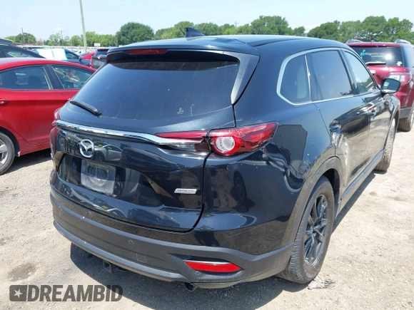 2016 Mazda CX-9 Touring with VIN JM3TCACY7G0101632, listed as a IAAI auction lot 42191115 with 163,070 mi miles and . Bid and sale history available at DreamBid. Image 4.