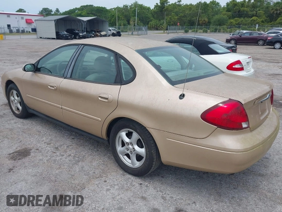 2003 Ford Taurus SES Standard with VIN 1FAFP55213A225447, listed as a IAAI auction lot 42206073 with 177,163 mi miles. Bid and sale history available at carsss.com. Image 3.